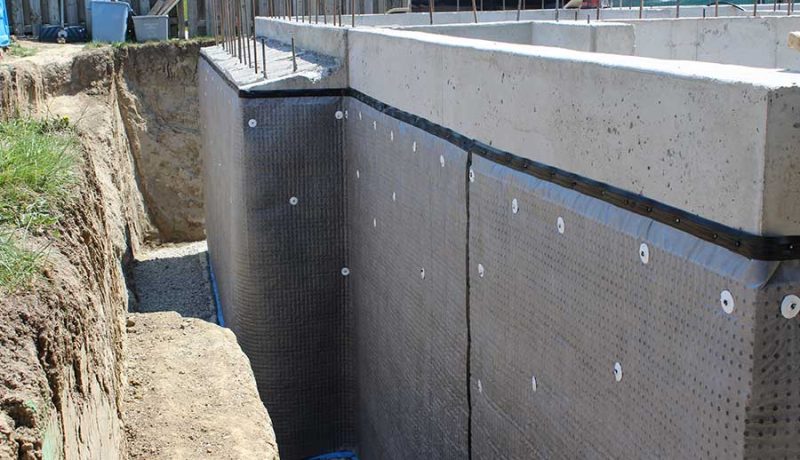 basement wall clad in waterproof coating