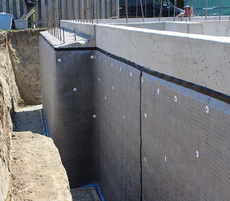 basement wall clad in waterproof coating